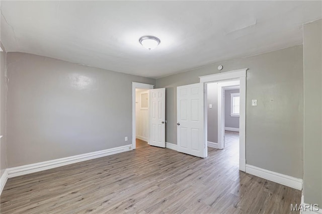 1105 Pennsylvania Ave, Saint Louis, MO 63130 - unfurnished room featuring wood finished floors and baseboards