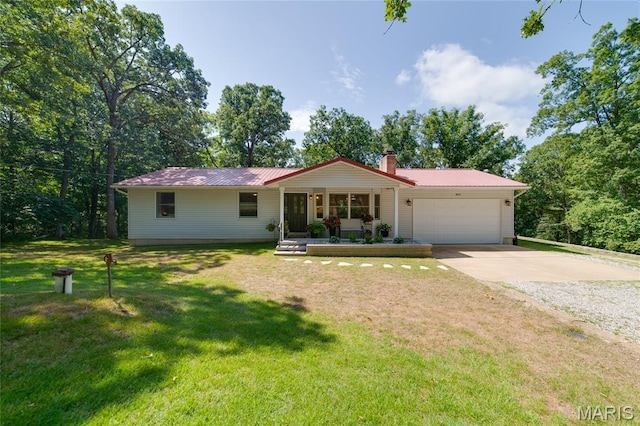 8870 State Road Nn, Cedar Hill, MO 63016 - ranch-style home with driveway, an attached garage, a metal roof, and a front yard