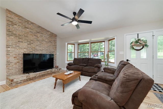 8870 State Road Nn, Cedar Hill, MO 63016 - living area featuring ceiling fan, wood finished floors, and vaulted ceiling