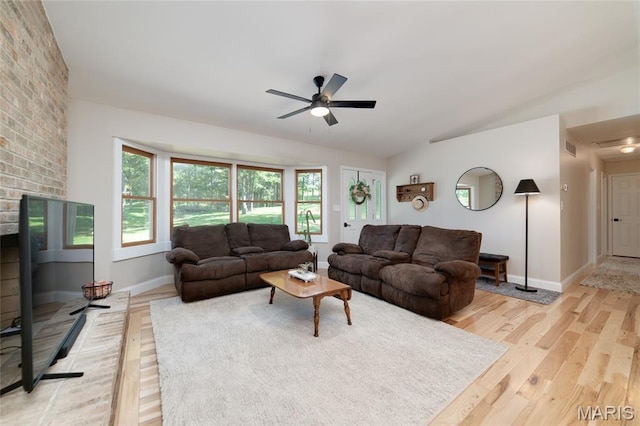 8870 State Road Nn, Cedar Hill, MO 63016 - living area featuring light wood-type flooring, a ceiling fan, and vaulted ceiling