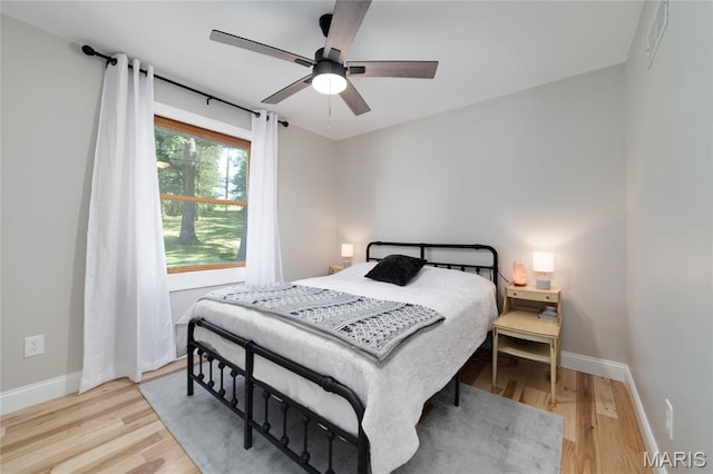 8870 State Road Nn, Cedar Hill, MO 63016 - bedroom featuring light wood finished floors and a ceiling fan