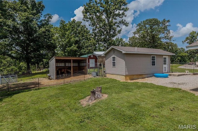 30053 Emily Ln, Lebanon, MO 65536 - rear view of property with an outbuilding