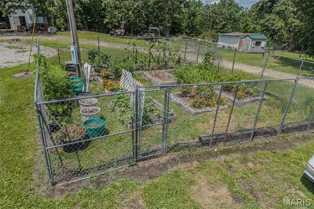 30053 Emily Ln, Lebanon, MO 65536 - view of yard featuring a vegetable garden and a gate