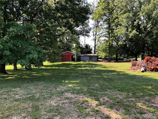 4612 Wood Duck Rd, Pinckneyville, IL 62274 - view of grassy yard with an outbuilding