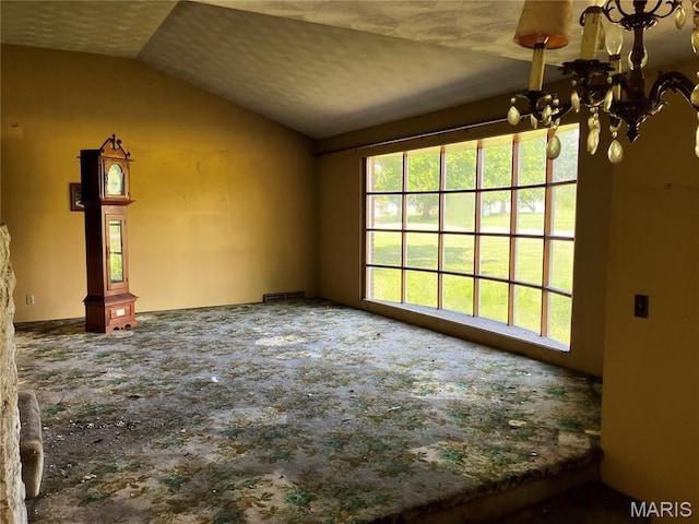 4612 Wood Duck Rd, Pinckneyville, IL 62274 - unfurnished room with lofted ceiling, a chandelier, and carpet floors