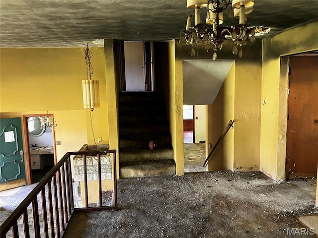 4612 Wood Duck Rd, Pinckneyville, IL 62274 - corridor with a chandelier and an upstairs landing