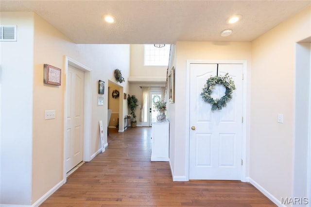 11907 Pine Forest Dr, Rolla, MO 65401 - entryway with hardwood / wood-style flooring and recessed lighting