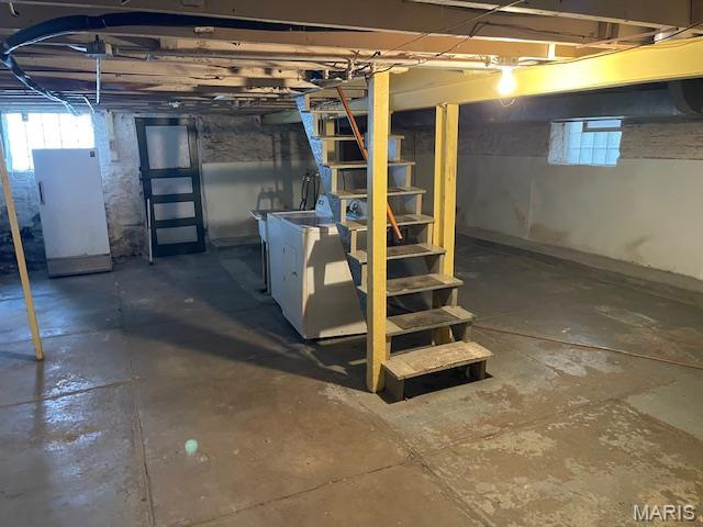 5461 Eichelberger St, Saint Louis, MO 63109 - below grade area with washing machine and dryer and stairway