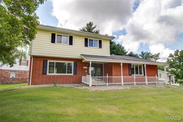 1513 Colonial Dr, Godfrey, IL 62035 - view of front facade with brick siding and a front lawn
