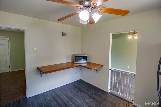 1513 Colonial Dr, Godfrey, IL 62035 - unfurnished office with dark wood-style flooring and ceiling fan