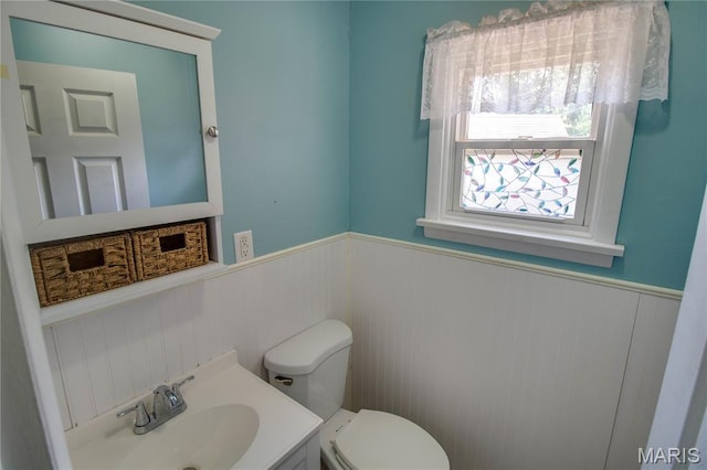 1513 Colonial Dr, Godfrey, IL 62035 - bathroom with a wainscoted wall and vanity
