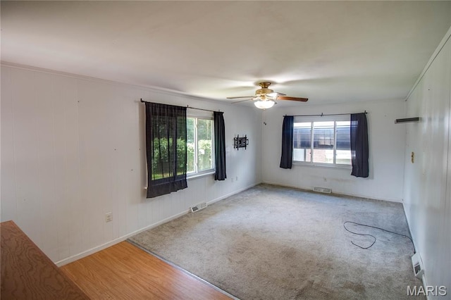 1513 Colonial Dr, Godfrey, IL 62035 - empty room featuring a ceiling fan and baseboards