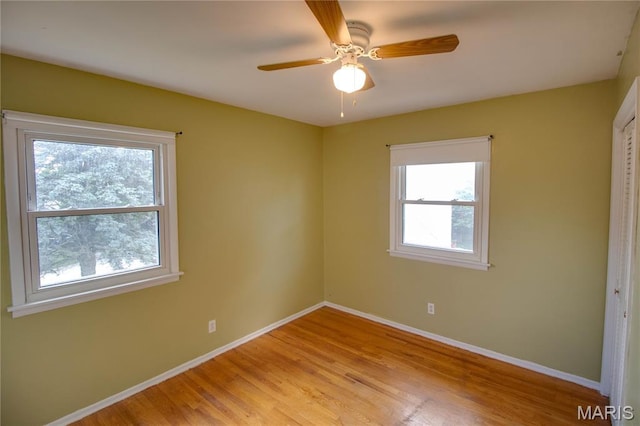 1513 Colonial Dr, Godfrey, IL 62035 - unfurnished room with light wood-style floors and ceiling fan