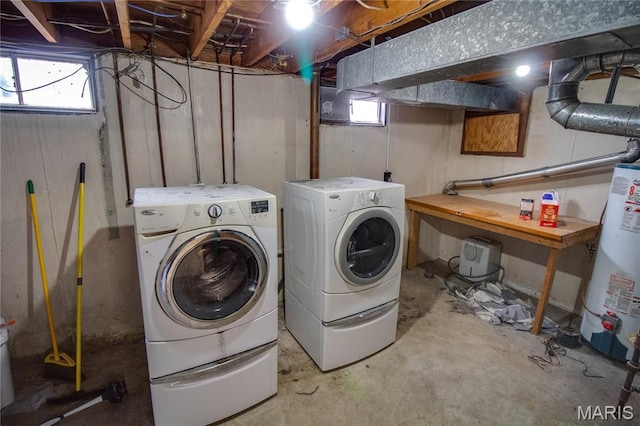 1513 Colonial Dr, Godfrey, IL 62035 - washroom with water heater and washing machine and dryer