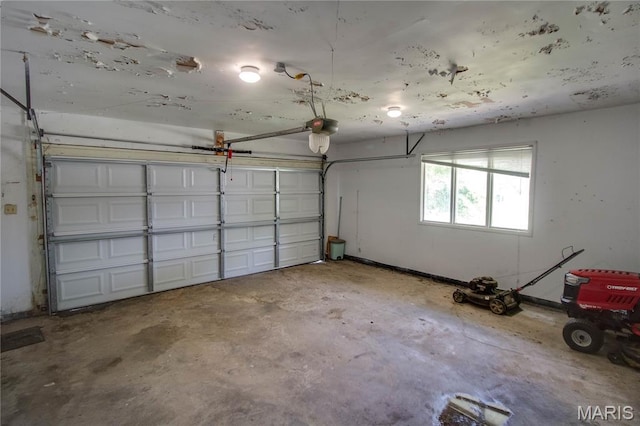 1513 Colonial Dr, Godfrey, IL 62035 - garage featuring a garage door opener