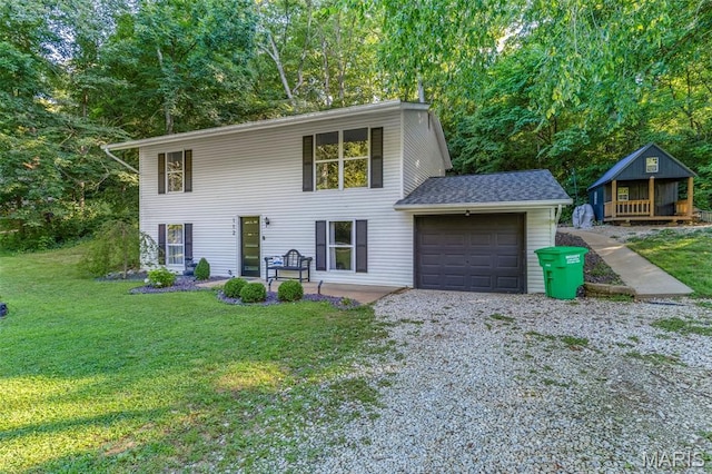112 Dale Dr, Hillsboro, MO 63050 - view of front of home with gravel driveway, an attached garage, and a front lawn