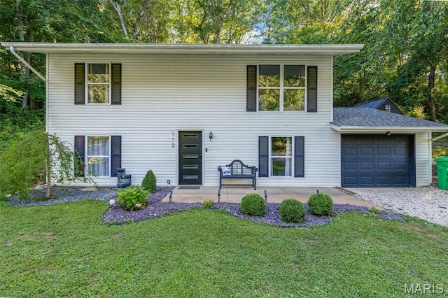 112 Dale Dr, Hillsboro, MO 63050 - view of front of property featuring an attached garage, a front yard, and driveway