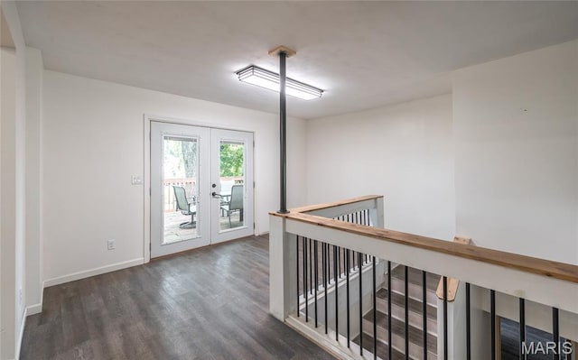920 E 7th St, Rolla, MO 65401 - spare room featuring french doors and wood finished floors