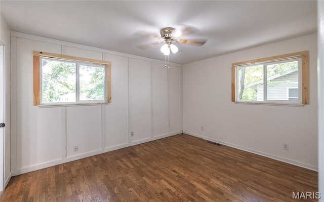 920 E 7th St, Rolla, MO 65401 - unfurnished room with wood finished floors and a ceiling fan