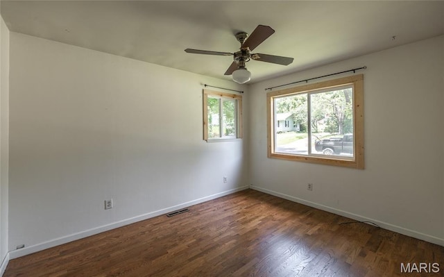920 E 7th St, Rolla, MO 65401 - spare room with wood finished floors and ceiling fan