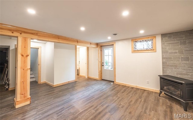 920 E 7th St, Rolla, MO 65401 - basement with a wood stove, wood finished floors, recessed lighting, and stairway