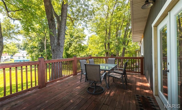 920 E 7th St, Rolla, MO 65401 - wooden terrace featuring outdoor dining area