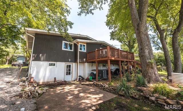 920 E 7th St, Rolla, MO 65401 - rear view of property featuring a deck and a patio area