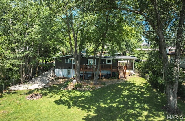 920 E 7th St, Rolla, MO 65401 - rear view of house featuring stairway and a deck