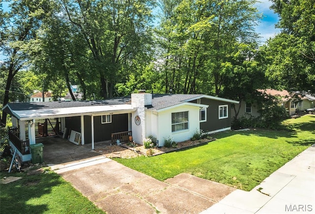 920 E 7th St, Rolla, MO 65401 - ranch-style house with driveway, an attached carport, a chimney, and a front yard