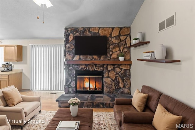 607 Sparrow Ct, Troy, IL 62294 - living area with wood finished floors and a fireplace