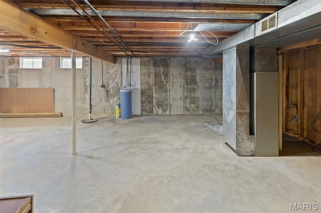 607 Sparrow Ct, Troy, IL 62294 - below grade area featuring a water softener system and heating unit