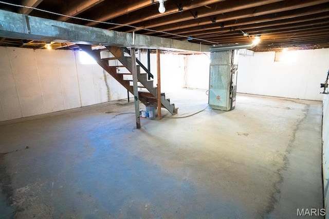 11005 Florence Ave, Saint Ann, MO 63074 - basement with stairway and heating unit