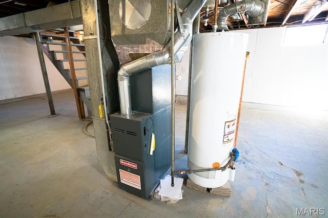 11005 Florence Ave, Saint Ann, MO 63074 - utility room with gas water heater and heating unit