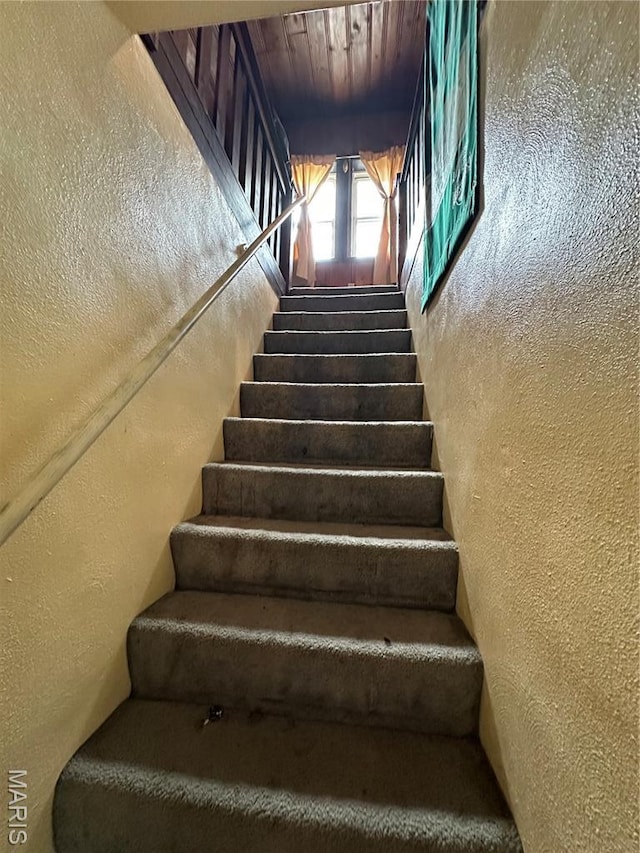 720 Tiffin Ave, Ferguson, MO 63135 - staircase featuring a textured wall