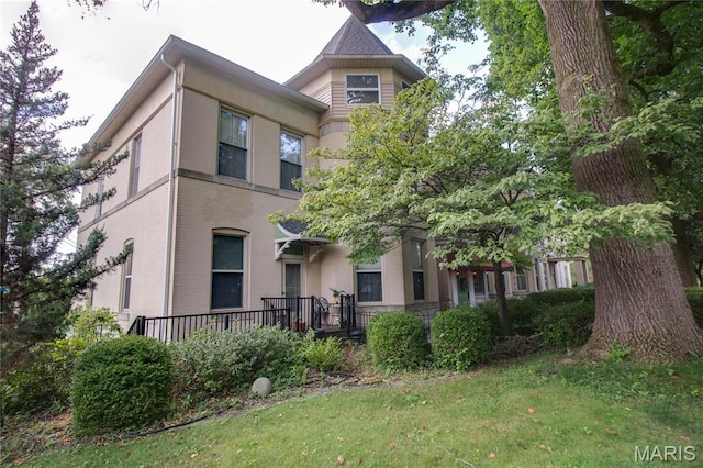 417 Prospect St Unit A, Alton, IL 62002 - rear view of house with stucco siding
