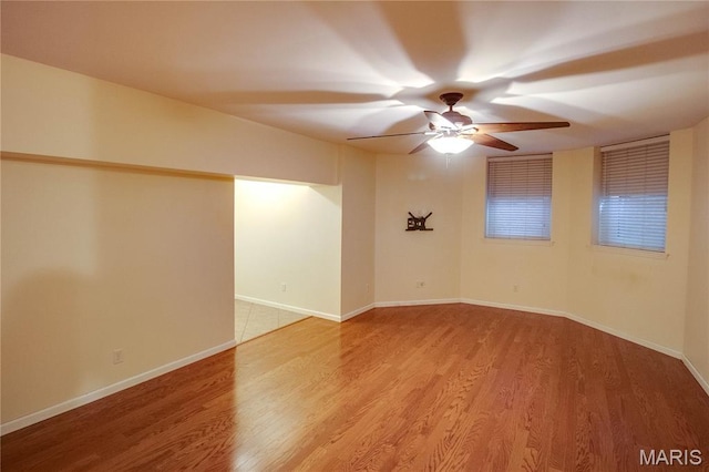 417 Prospect St Unit A, Alton, IL 62002 - empty room with ceiling fan and light wood finished floors