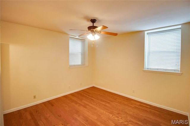 417 Prospect St Unit A, Alton, IL 62002 - unfurnished room featuring a ceiling fan and light wood-style flooring