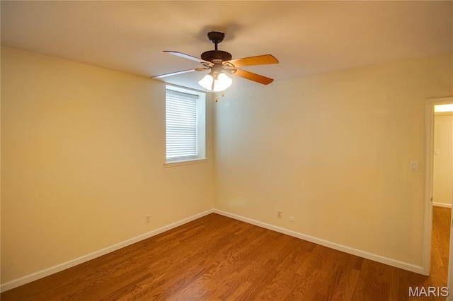 417 Prospect St Unit A, Alton, IL 62002 - unfurnished room featuring wood finished floors and a ceiling fan
