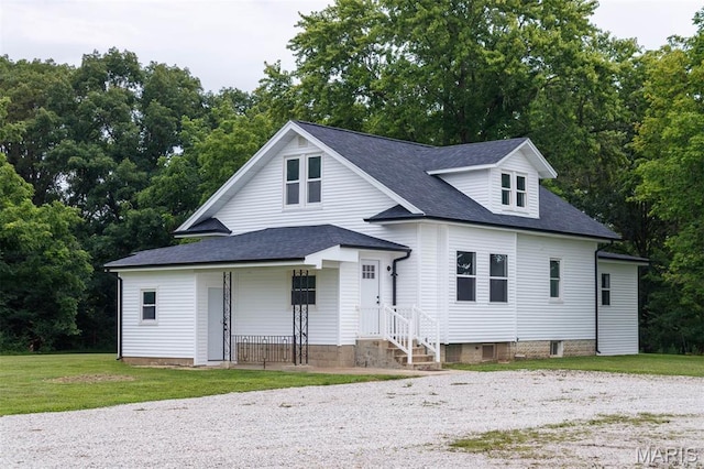 18347 Windy Hill Rd, Staunton, IL 62088 - view of front of home featuring a front lawn, roof with shingles, view of wooded area, and covered porch