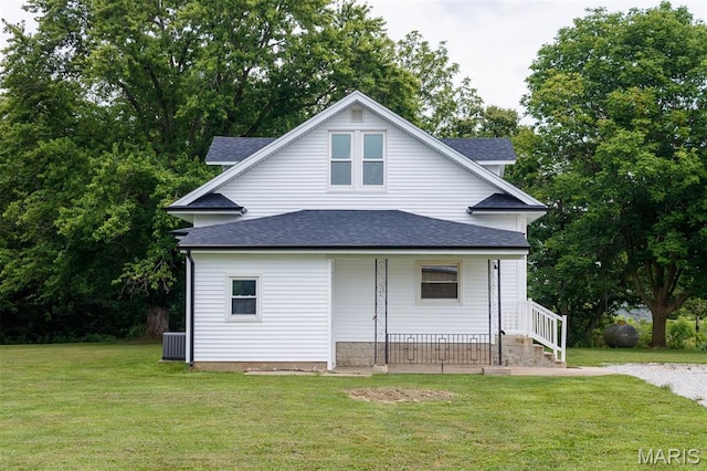 18347 Windy Hill Rd, Staunton, IL 62088 - view of front of home with roof with shingles, covered porch, and a front yard