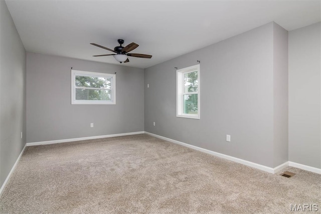 18347 Windy Hill Rd, Staunton, IL 62088 - unfurnished room with carpet floors and a ceiling fan