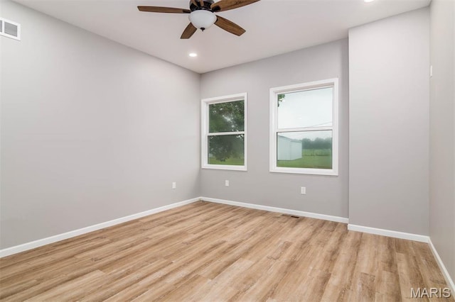 18347 Windy Hill Rd, Staunton, IL 62088 - empty room featuring ceiling fan, light wood finished floors, and recessed lighting