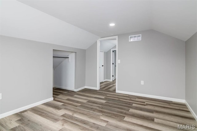 18347 Windy Hill Rd, Staunton, IL 62088 - additional living space with lofted ceiling, wood finished floors, and recessed lighting