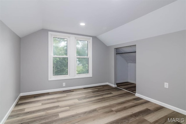 18347 Windy Hill Rd, Staunton, IL 62088 - additional living space featuring vaulted ceiling, wood finished floors, and recessed lighting