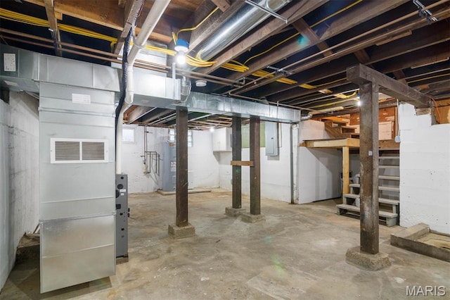 18347 Windy Hill Rd, Staunton, IL 62088 - unfinished basement featuring stairway, electric panel, and water heater