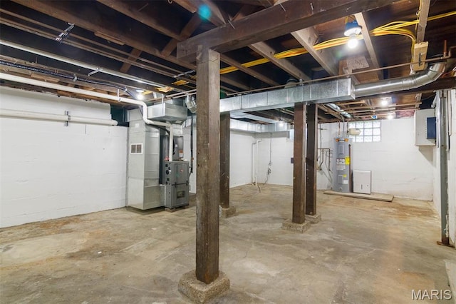 18347 Windy Hill Rd, Staunton, IL 62088 - below grade area with water heater, heating unit, and concrete block wall