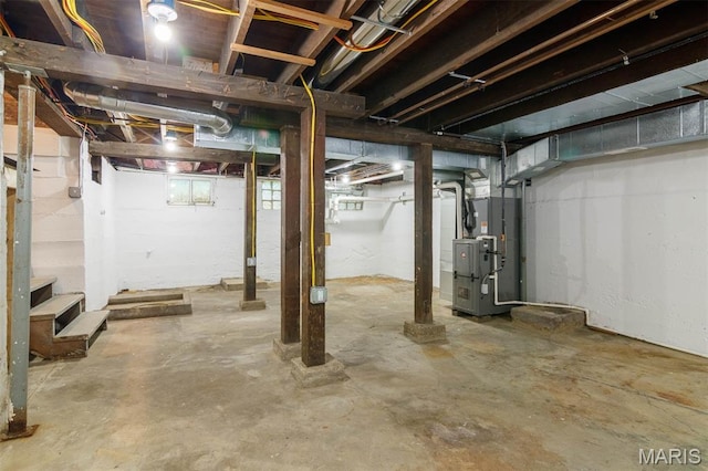 18347 Windy Hill Rd, Staunton, IL 62088 - below grade area featuring heating unit and stairs