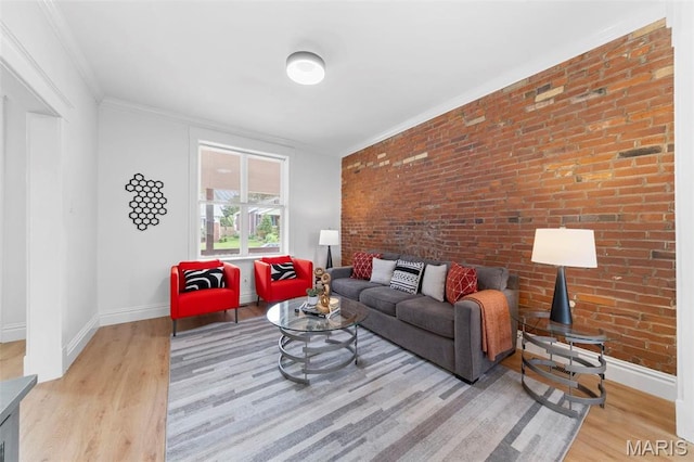 6206 Victoria Ave, Saint Louis, MO 63139 - living room with wood finished floors, brick wall, and ornamental molding