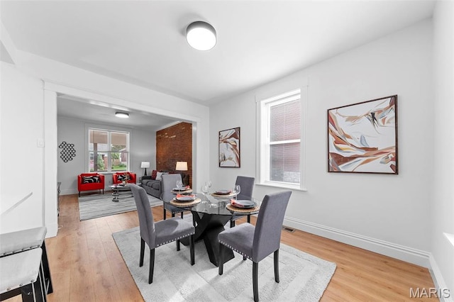 6206 Victoria Ave, Saint Louis, MO 63139 - dining space with light wood-style flooring