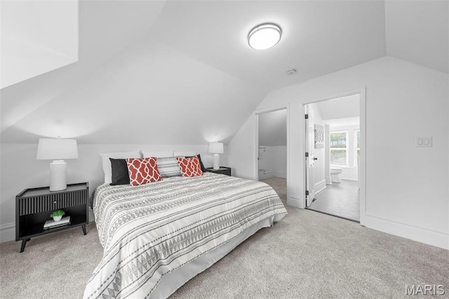6206 Victoria Ave, Saint Louis, MO 63139 - bedroom with carpet flooring, vaulted ceiling, and connected bathroom